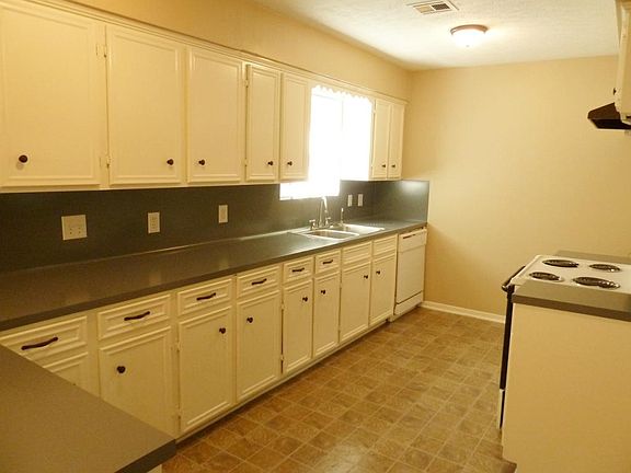 The kitchen has so much counter/cabinet space. The cabinets have pretty oil rubbed bronze hardware for an updated look.