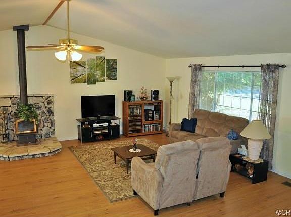 Great room with vaulted ceiling, and new laminate floors!