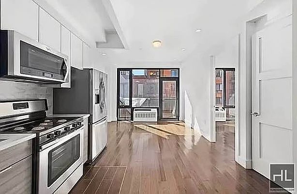 1st image of 399 E 8th St APT 7B