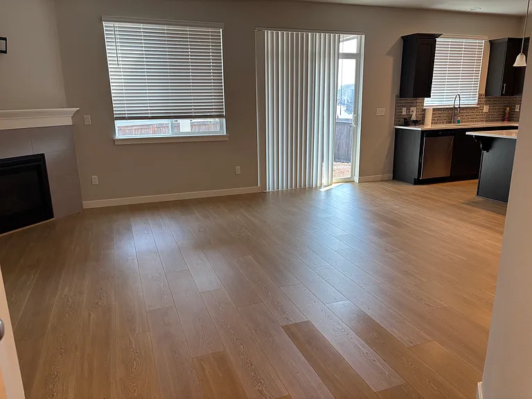 FAMILY ROOM - KITCHEN FROM ENTRY HALLWAY