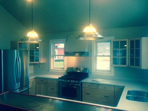 new counter tops, refrigerator, sink and faucet