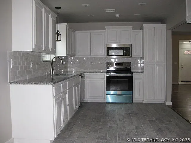 9224 S Hudson Ave — Photo 4