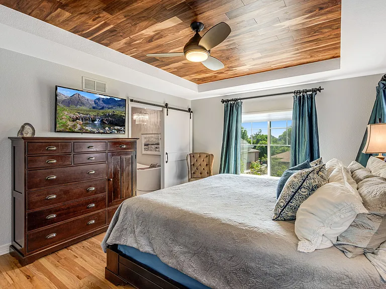 Solid core barn door keeps the master bath and bedroom very quiet