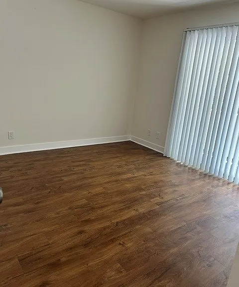 Bedroom with walk-out balcony.
