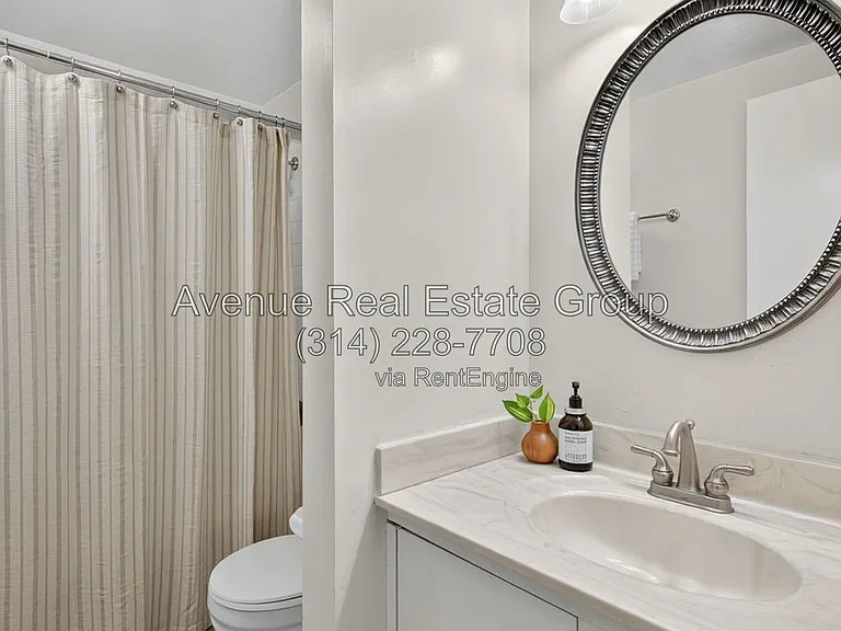 5559 Pershing Ave #1F — Photo 35