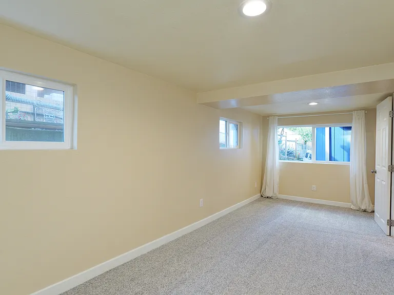 Downstairs - 2nd Bedroom (w/ Queen)