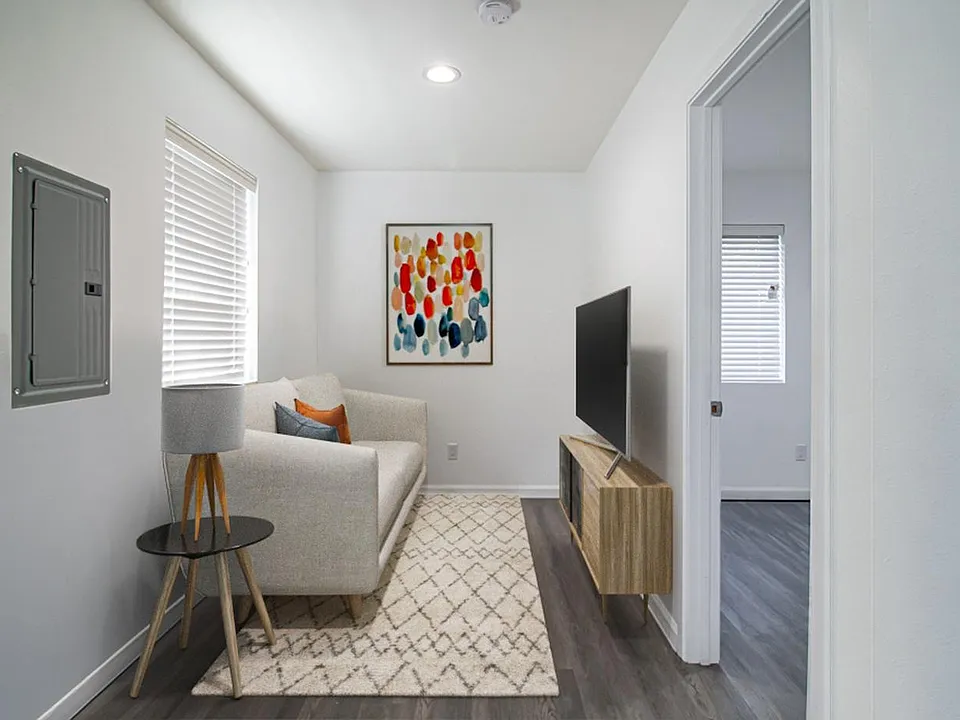 This image shows a virtually furnished space. This space comes unfurnished but can be beautifully furnished by our in-house design team for an additional fee.