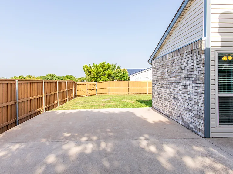 backyard - large outdoor cemented area