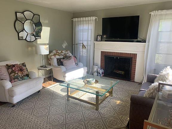 living room with current tenant's furnishings