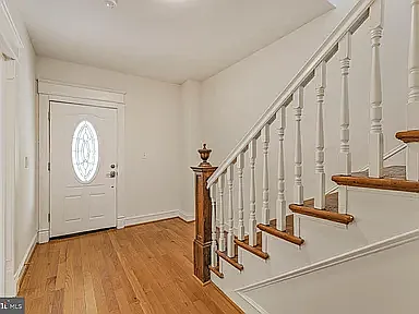 Entryway with hardwood floors