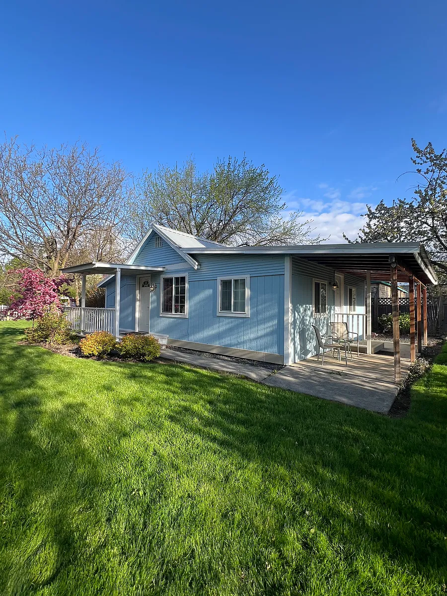 Private back covered patio, leading to off street alley parking area. - 225 West St