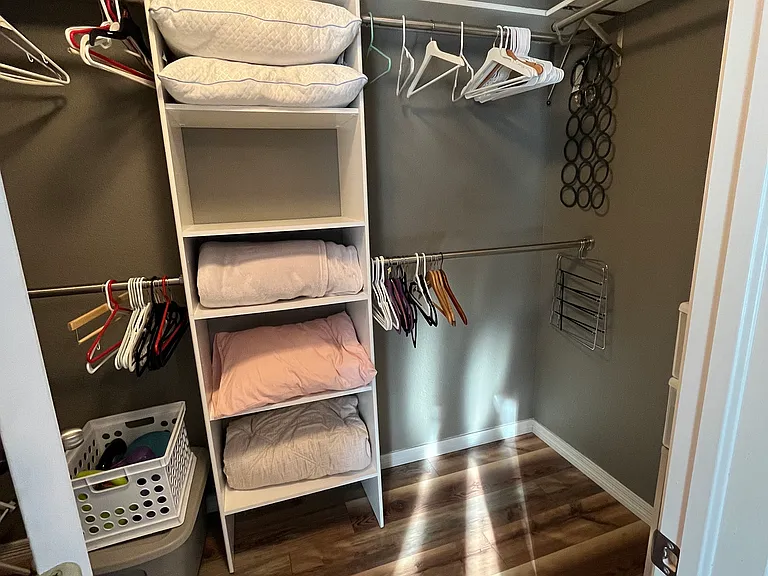 Walk-in closet in the master bedroom.