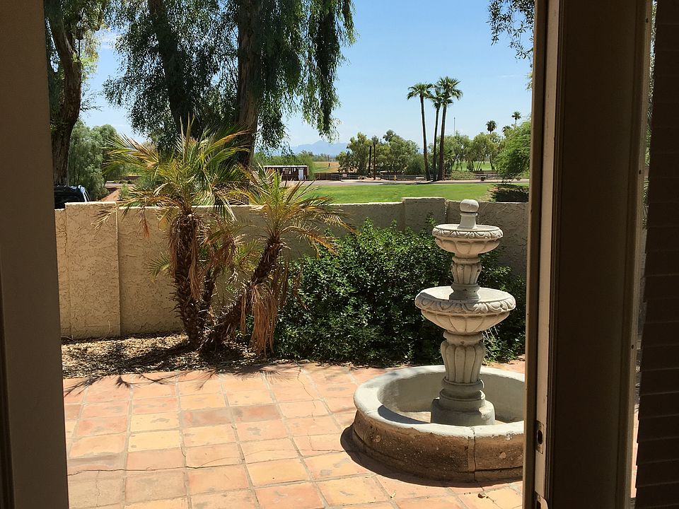 Patio overlooking golf course and mountains to the east
