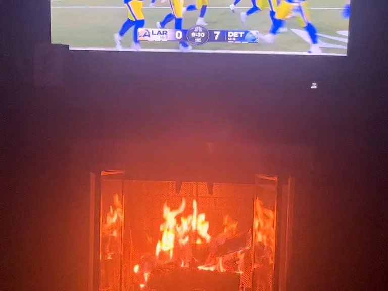 Great Fireplace with nice Samsung above.