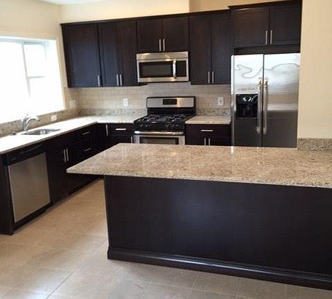 Renovated Kitchen and Appliances with granite countertops