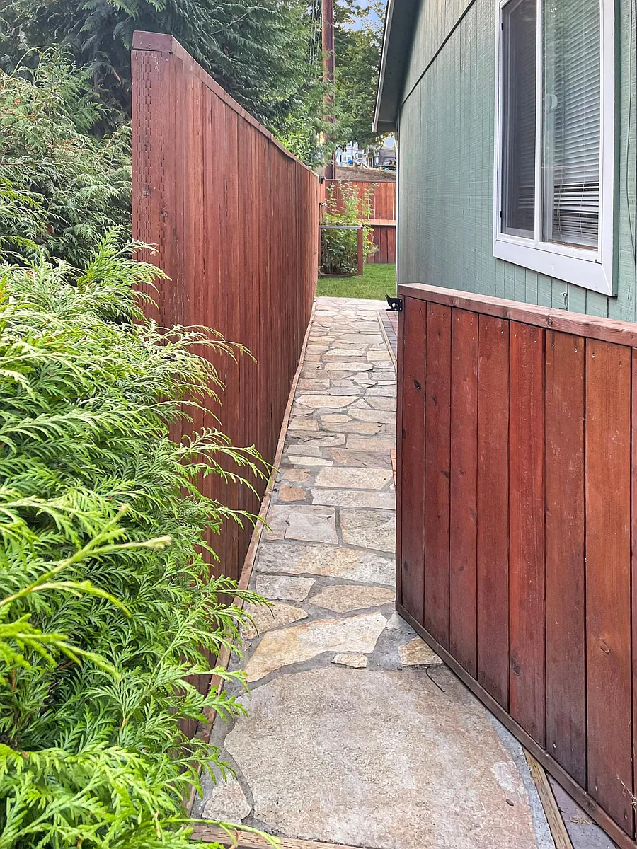 Pathway leading to backyard on south side of house - 2543 Green Ct SW