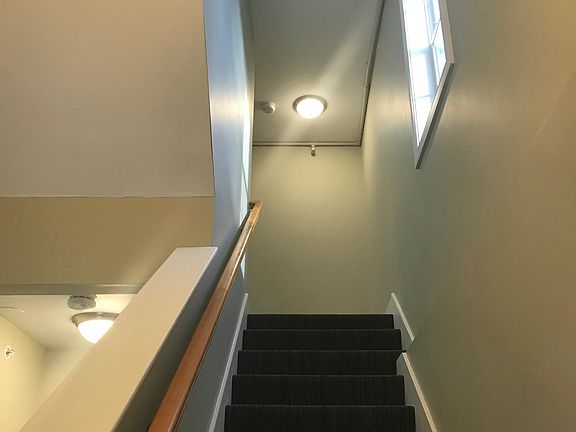 interior hall and stairs to unit (1 flight up)