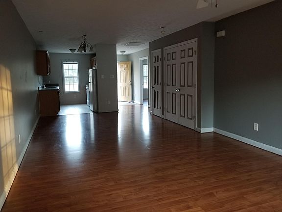 View from the back of the apartment. The first closet to the right is the washer and dryer hookup, and the one in front of that is a coat closet. The room closest to the front door is the second bedroom.