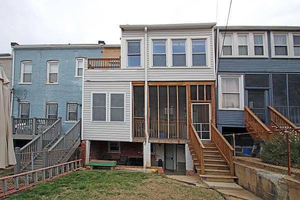 Back of house. Can use yard. Back basement entry.