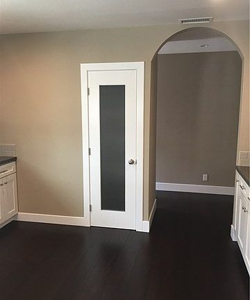 Pantry and entrance to washer and dryer area. As well as access to Master Bedroom and Side door exit