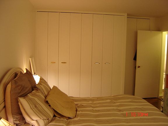 Oversized Bedroom featuring 2 of 5 double closets