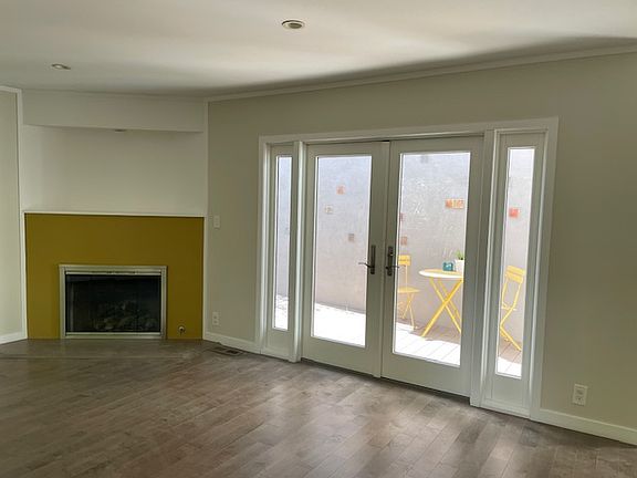 Living room opening to the middle patio