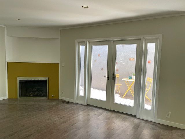 Living room opening to the middle patio