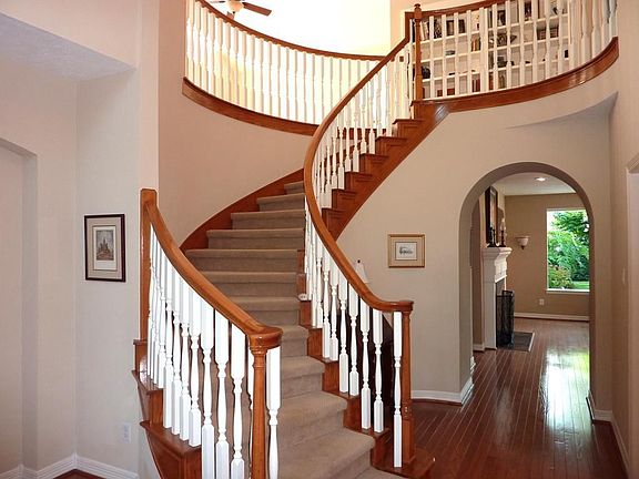 Grand Curved Staircase Entry