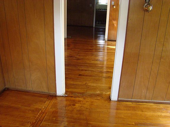 From bedroom looking through living room, to kitchen