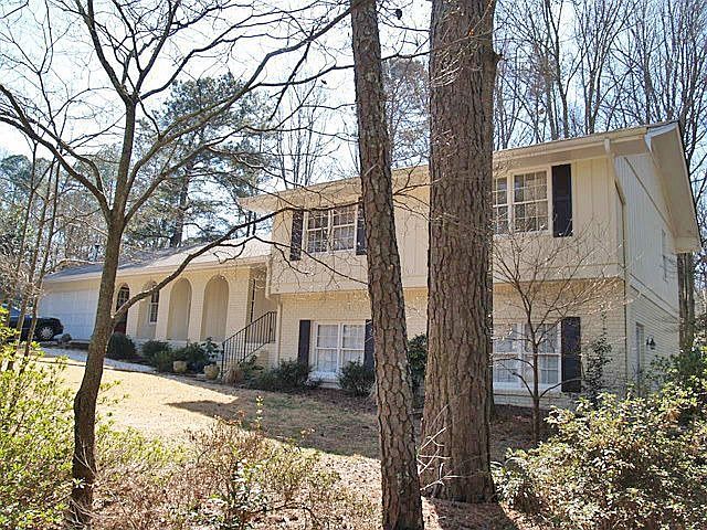 Front with dogwood tree's