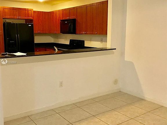 5th image of 10885 NW 89th Ter Unit 105