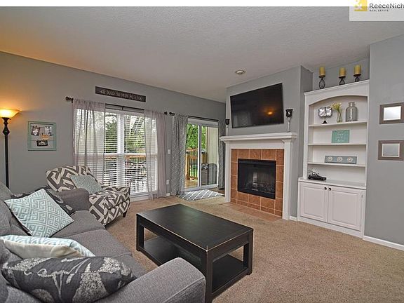 Lots of light in large living area with see through fireplace!