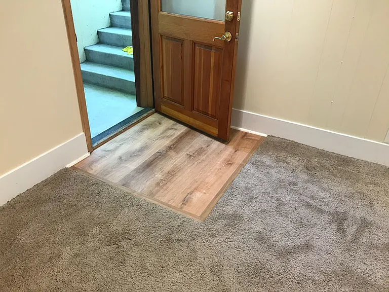 Vinyl in entryway.