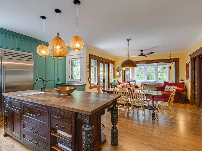 Kitchen and breakfast area, oversized island, and a casual conversation space.