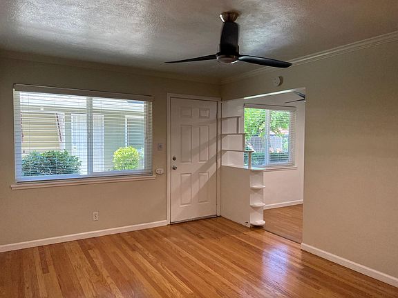 Energy efficient windows, front door and kitchen nook from living room