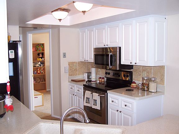 UPDATED CABINETS,COUNTERS,APPLIANCES,TILE,LIGHTS 