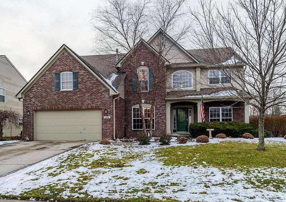 Attractive elevation welcomes you home to this 5 bedroom beauty with a 3 car tandem garage!