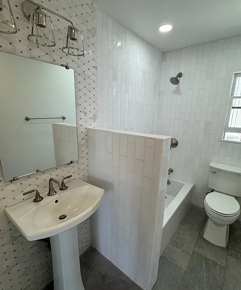 Bathroom with shower-tub combo