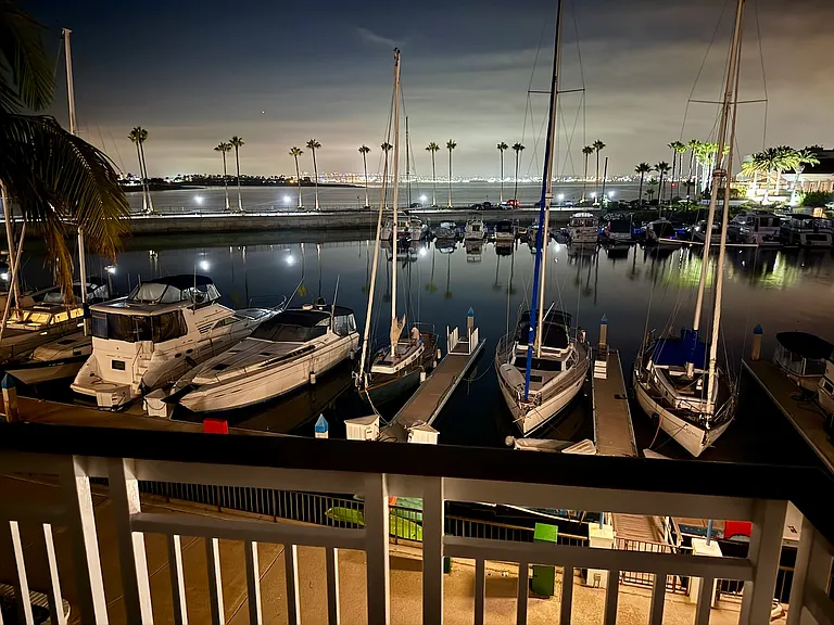 Night time view from Master Bedroom's balcony/deck - wide angle.