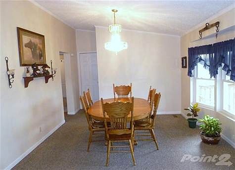 The dining room is cetnral to the floor plan accessing the kitchen, breakfast room, living room and the master bedroom.  Easy flowing floorplan!