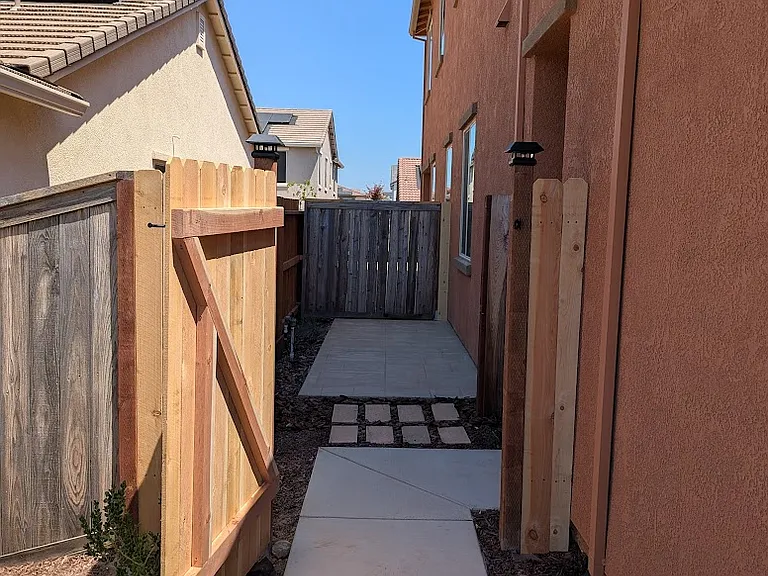Your private gated path. Pet-friendly and just walking distance from beautiful trails and a dog park. Enjoy a dedicated side yard perfect for fresh air. Ideal for professionals seeking convenience and comfort.