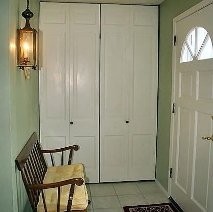 Foyer has new ceramic tile and an entrance closet