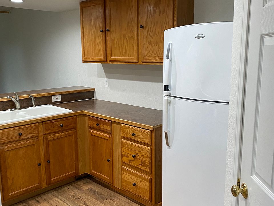 Kitchen has a spacious pantry, a new dishwasher and range.