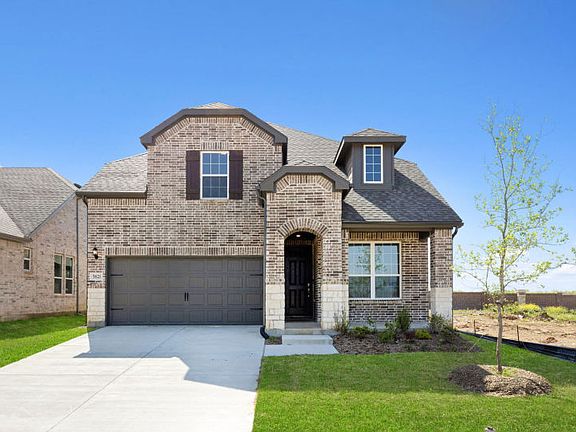 The Riverdale, a two-story home with 2-car garage, shown as Home Exterior B
