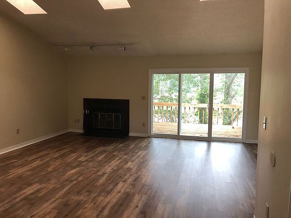 great room with sky lights