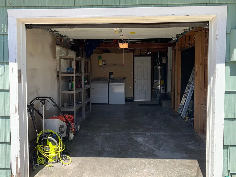 Spacious garage with storage, place to park