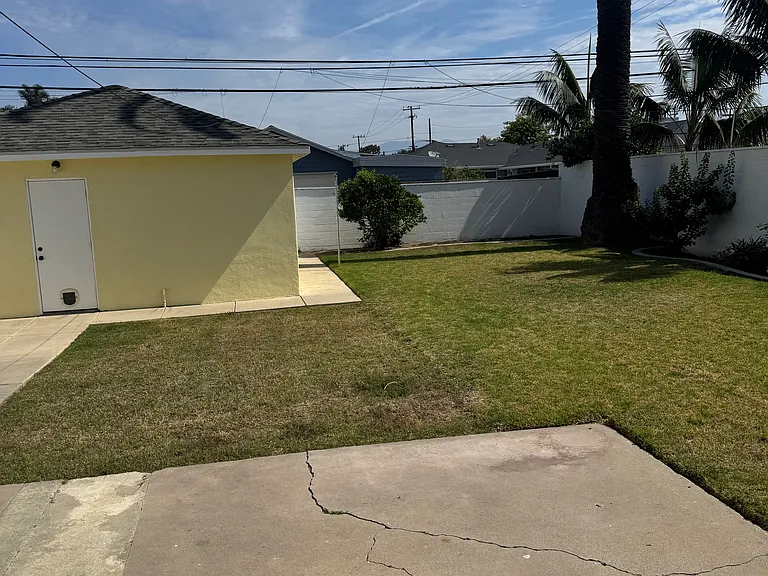 Backyard with detached garage