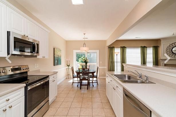 Kitchen and Dinning area with access to private Deck and Entertainment area