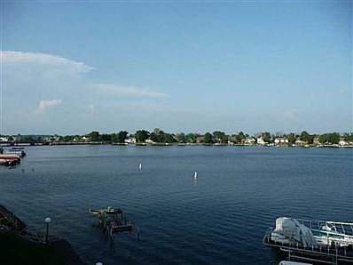 Exterior Front. Condo right on Morse Reservoir with one of the best views for under $100,000. One of the deepest boat docks as well. BEING SOLD FURNISHED! This could be your view!