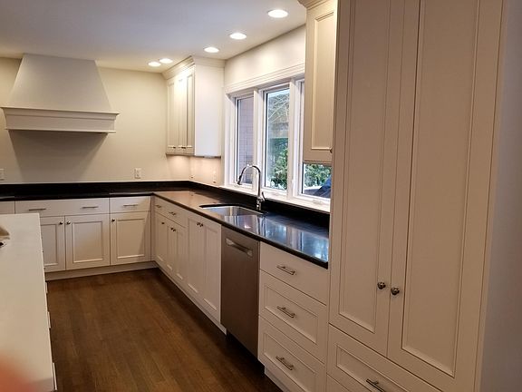 Main floor kitchen with all soft close doors and drawers. Induction cooktop. Island has plenty of storage as well.